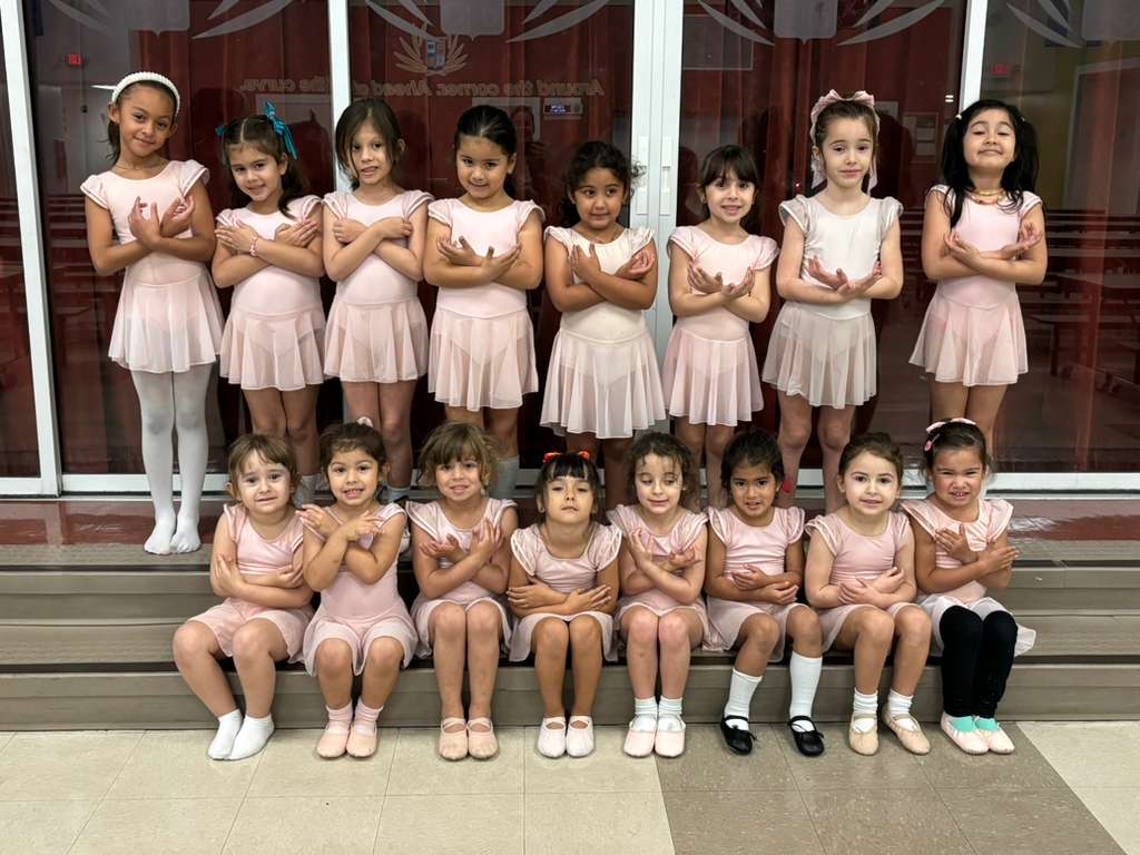 Children in colorful tutus at the ballet studio